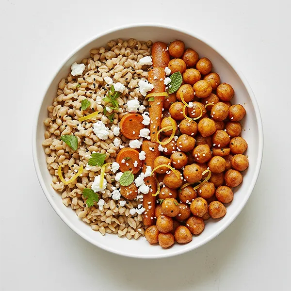 Harissa-Spiced Chickpea Bowl with Preserved Lemon, Farro, Carrots & Feta